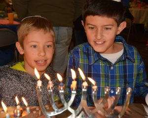 boys with Chanukah menorahs