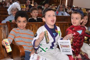 kids singing at a purim party