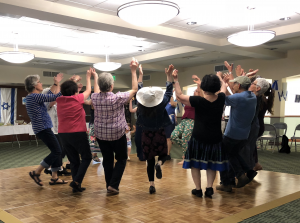 Adults Dancing in Temple Israel's Social Hall