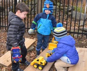 Kids Playing with Trucks